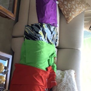 Lot of 3 golf shits and 1 golf skort Tops are size  S/P Skort is a 2